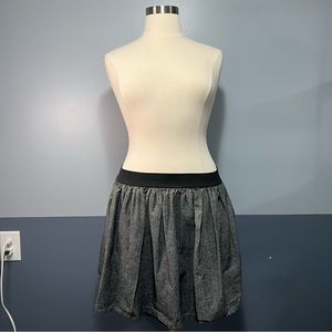Silver skirt.
